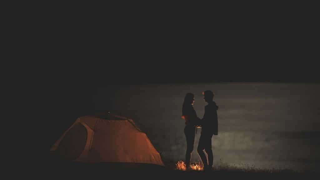 A man and woman having a camping 