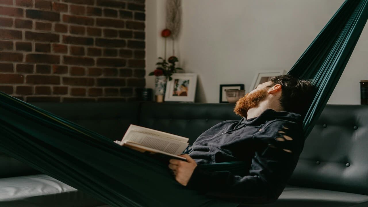 A man relaxing by himself at home