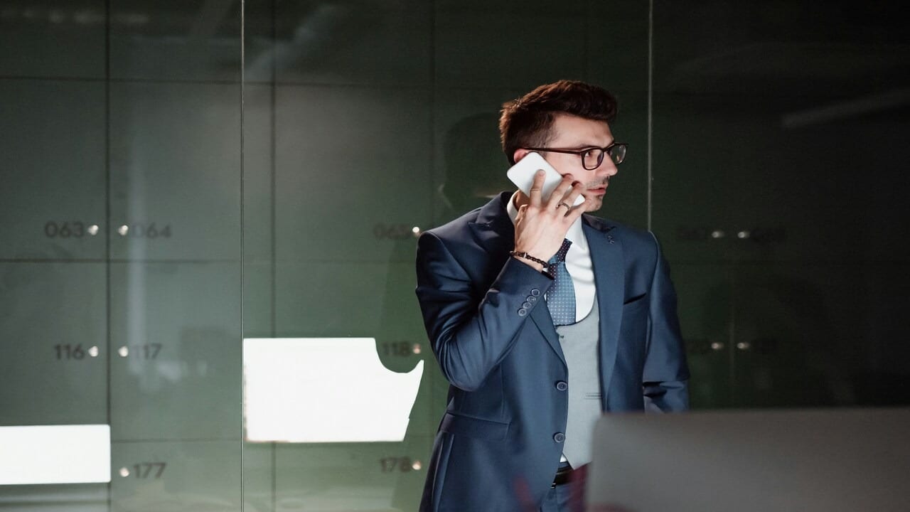 A man calling someone on the phone
