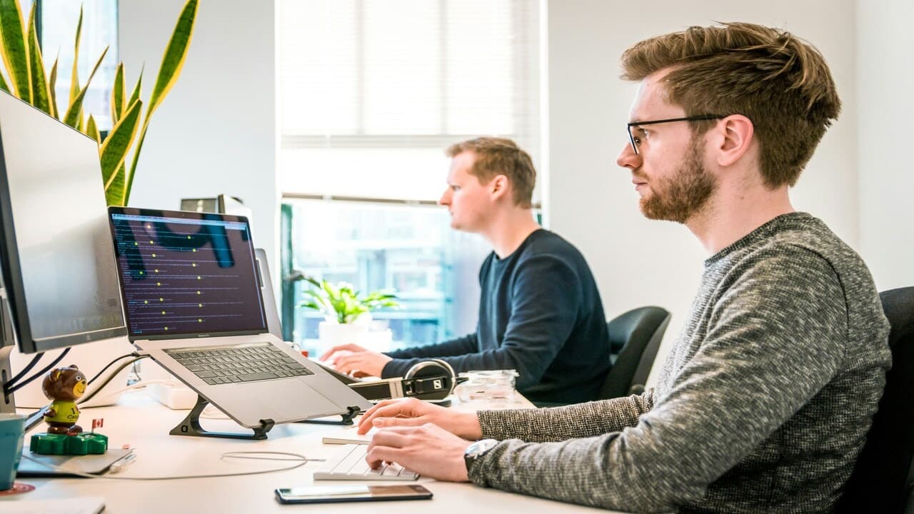Two men working in the office
