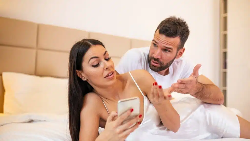 A man inquiring about the call coming on his wife’s phone.