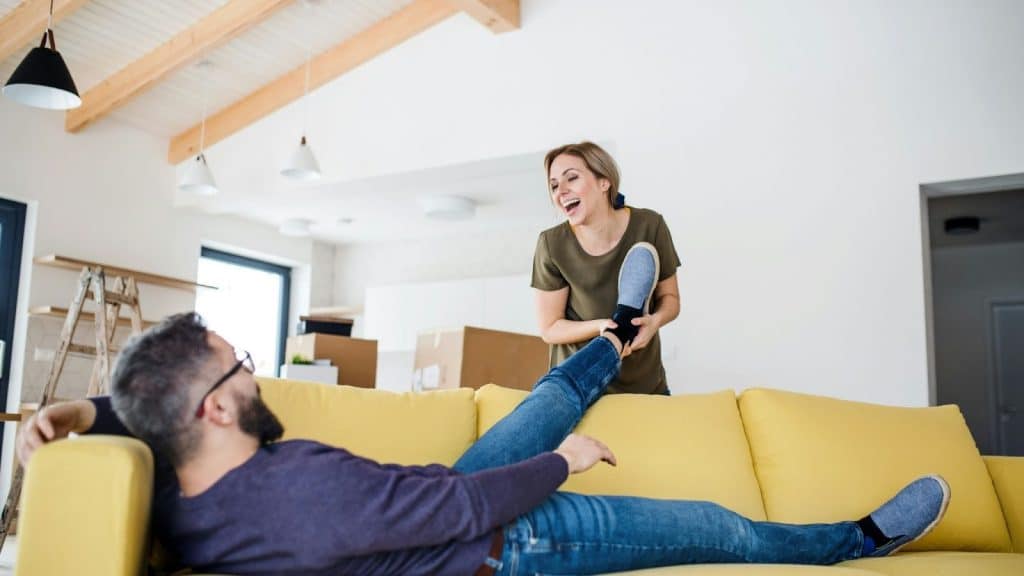 Woman being playful towards man