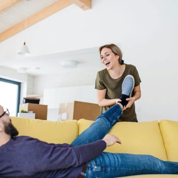 Woman being playful towards man