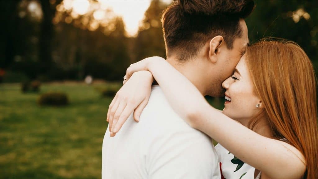 Woman hugging a man