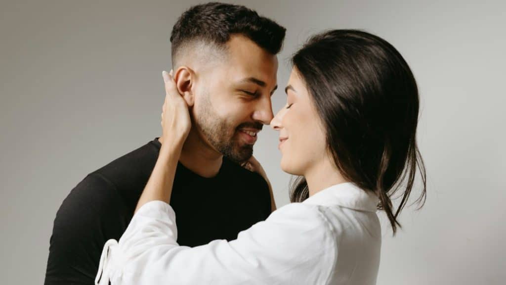 A man and woman close to each other