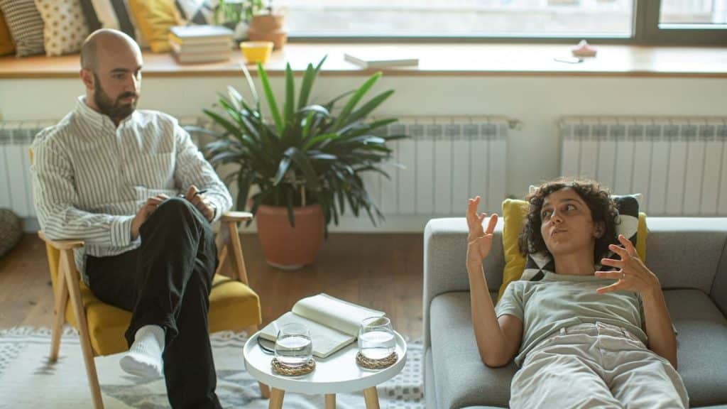 A man listening to woman