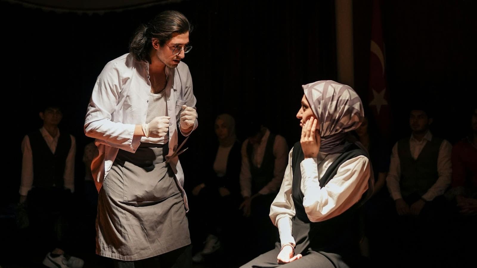 A man and woman at the play
