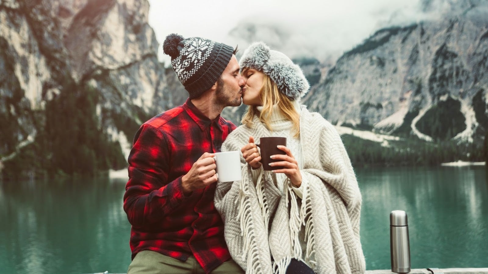 A man and woman kissing each other