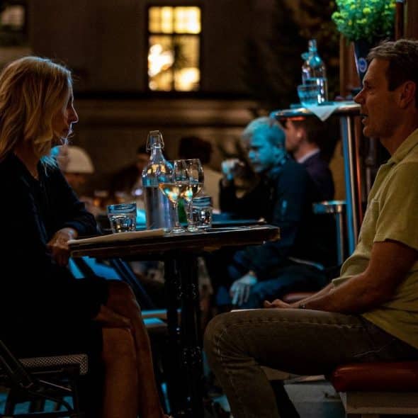 A man and woman having a dinner date