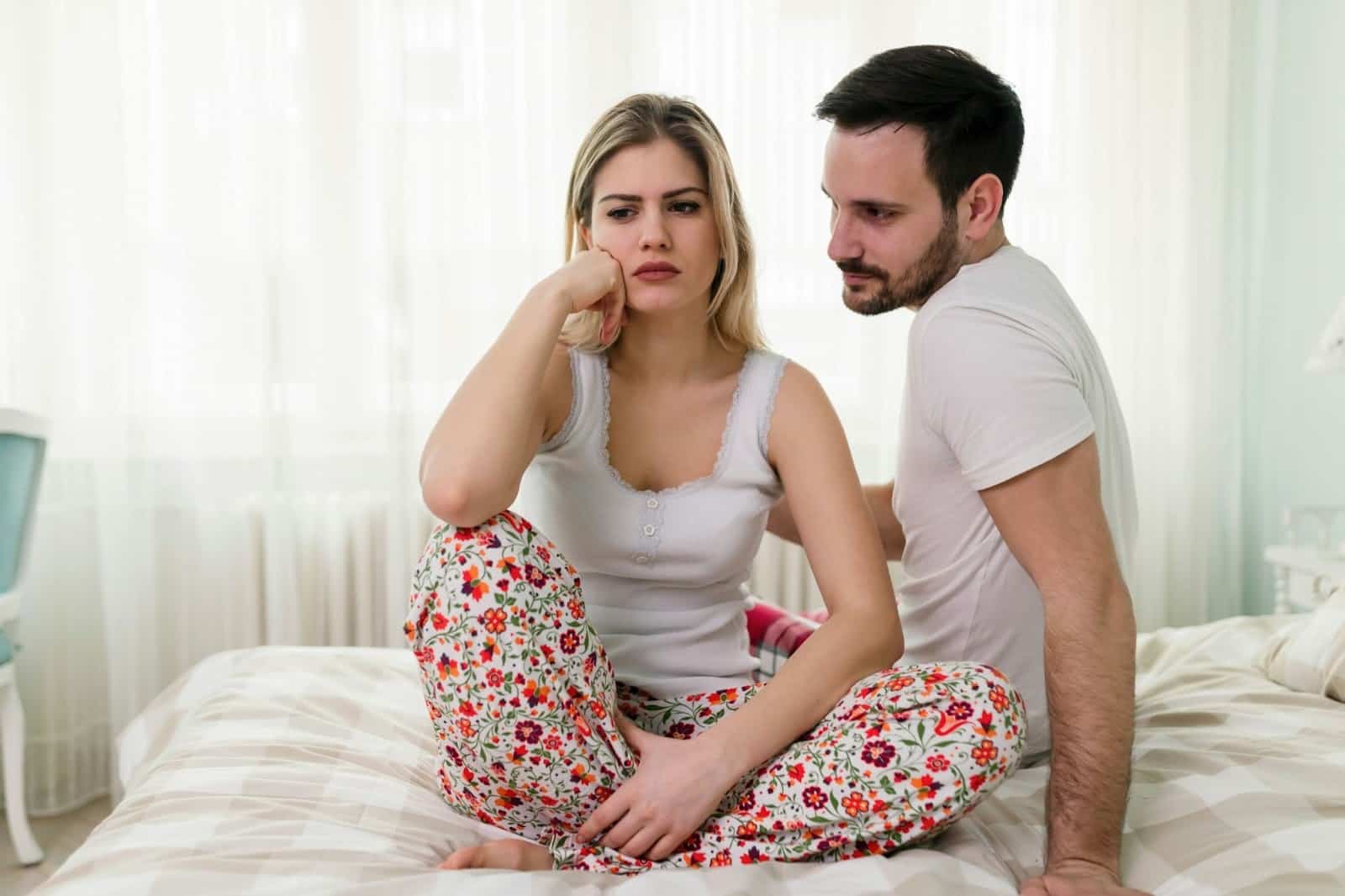 A woman listening to a man