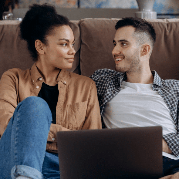 Couple having intimate moment on couch