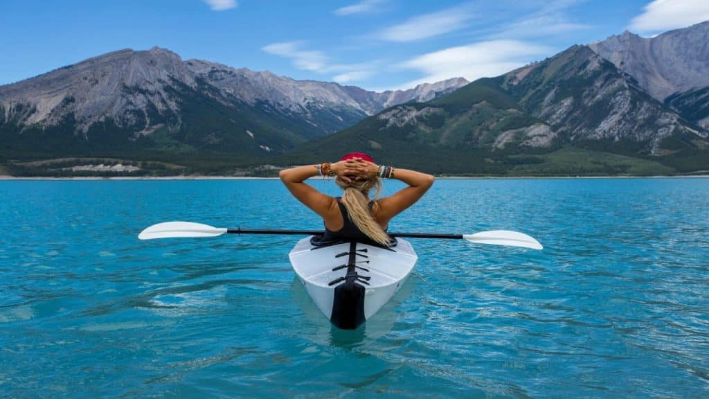 A woman kayaking by herself