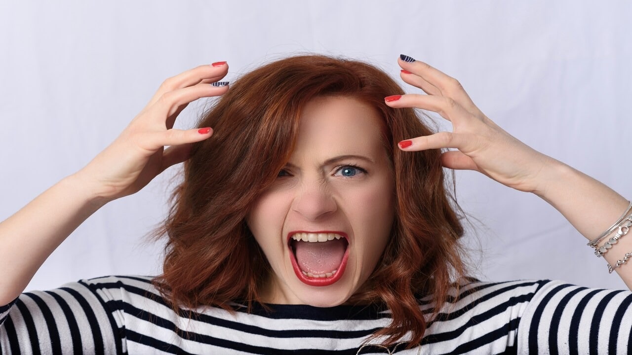 A woman looking frustrated