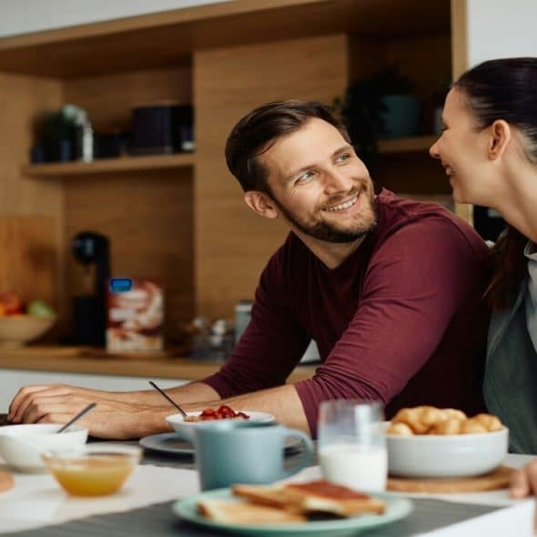 A couple having breakfast together