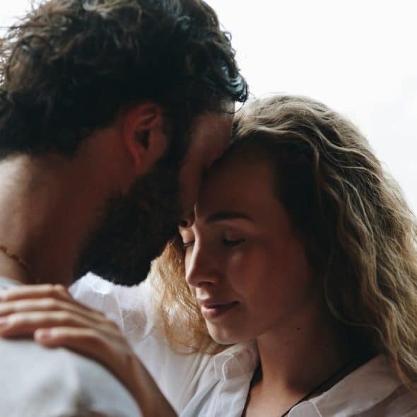 A loving couple having a romantic moment.