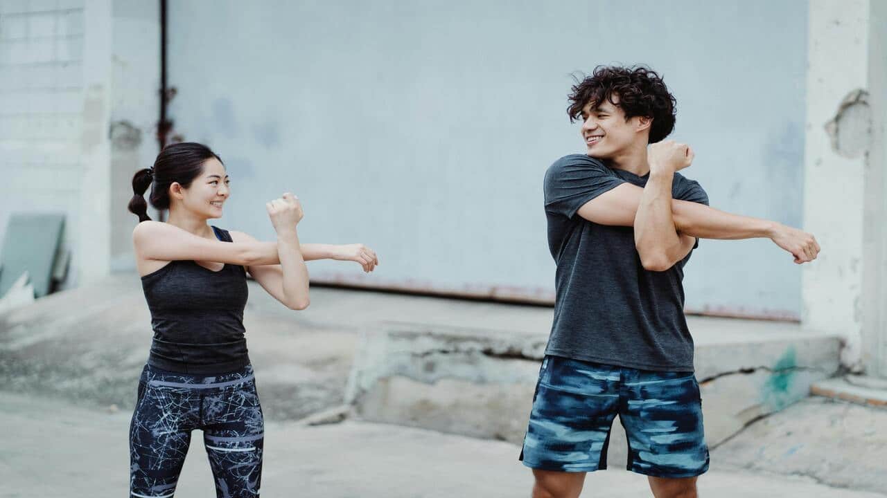 A couple working out together