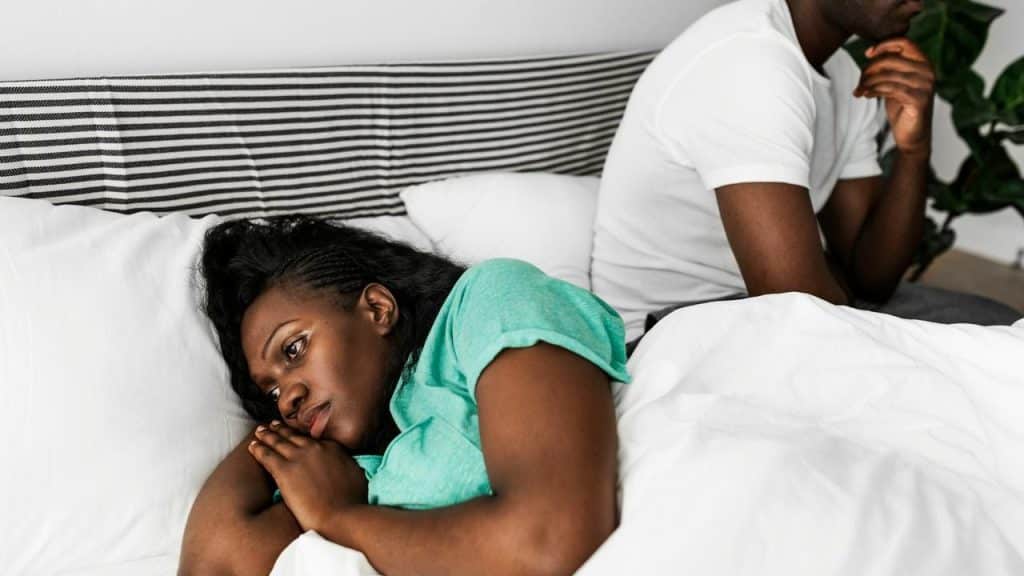 A couple ignoring each other