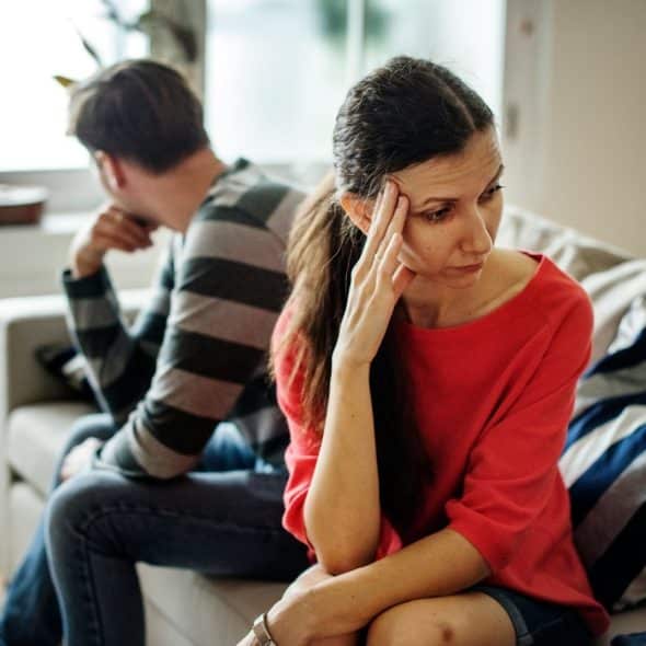 A man and woman are silent after arguing