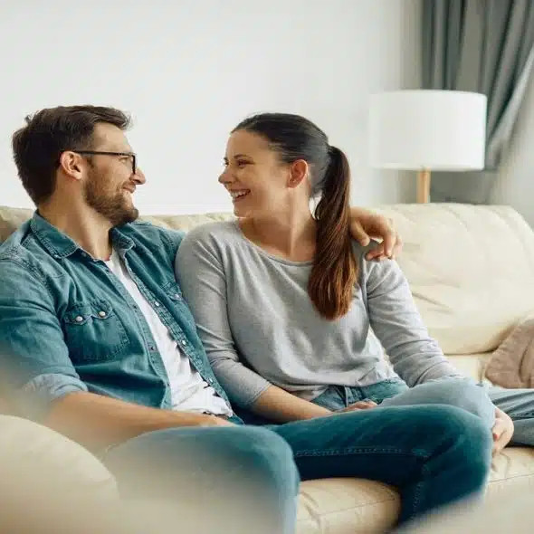 A couple spending time on the couch