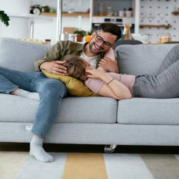 A couple talking at home