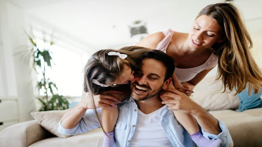 A family laughing at home