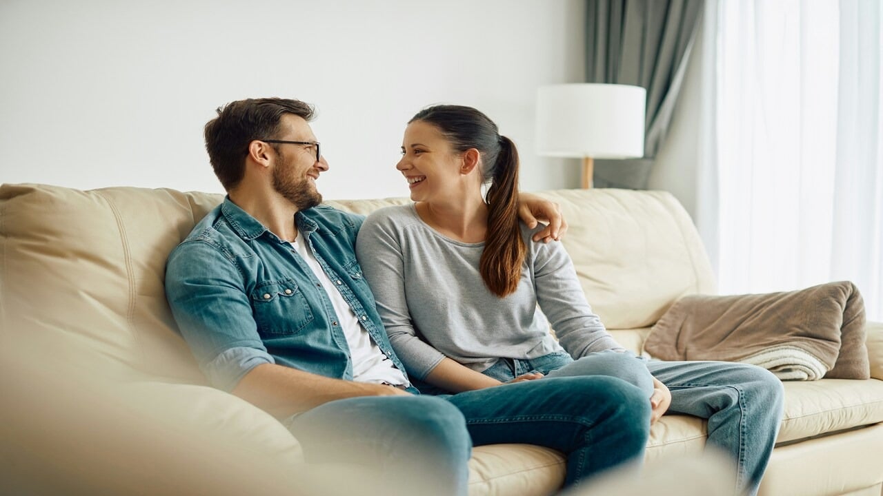 A couple spending time on the couch