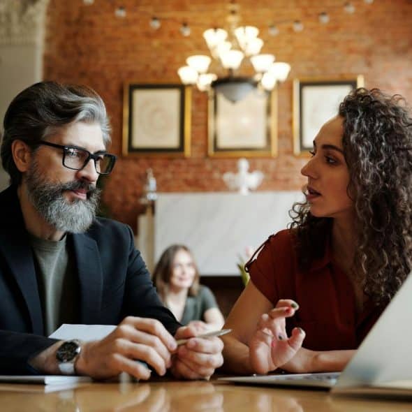 A man and woman talking