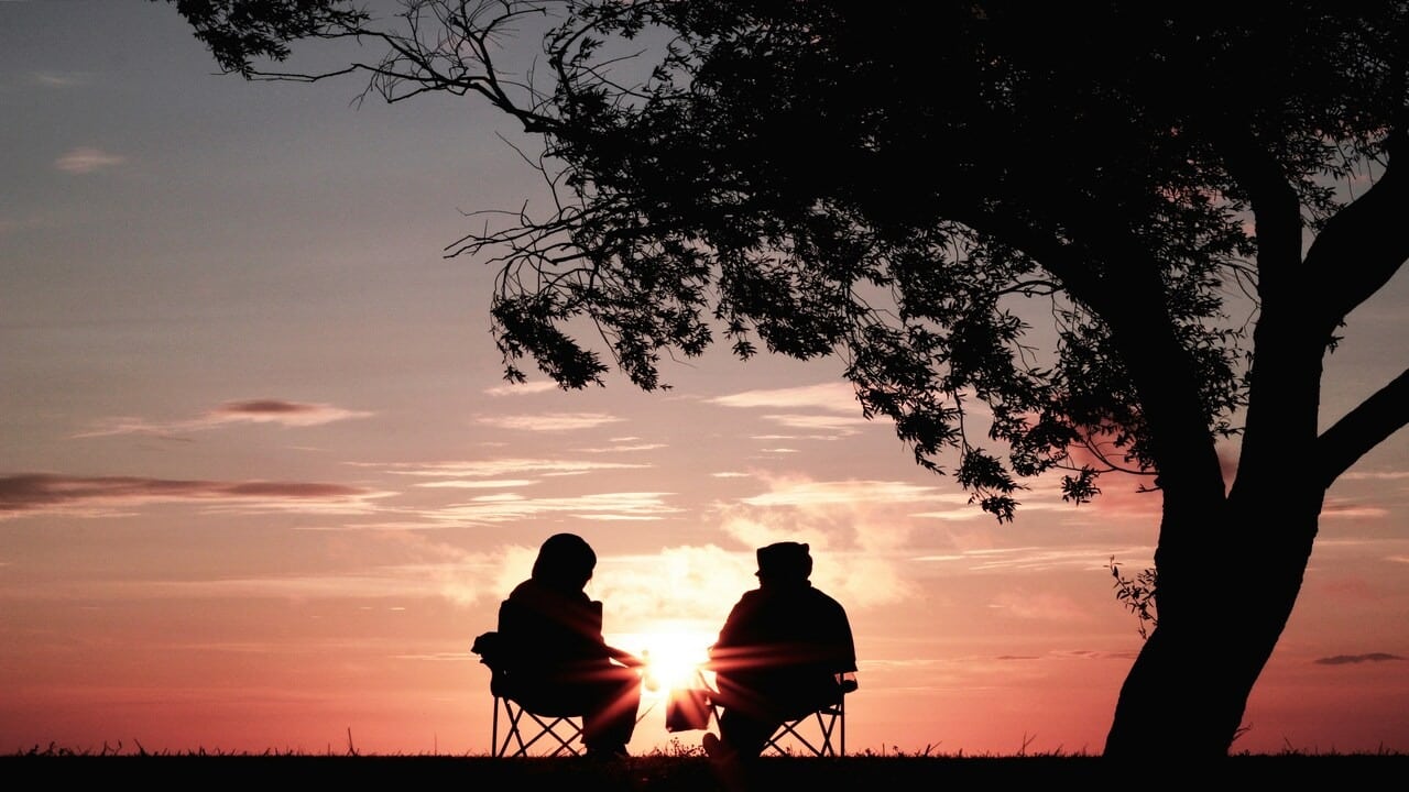 A couple having a serious talk outdoors