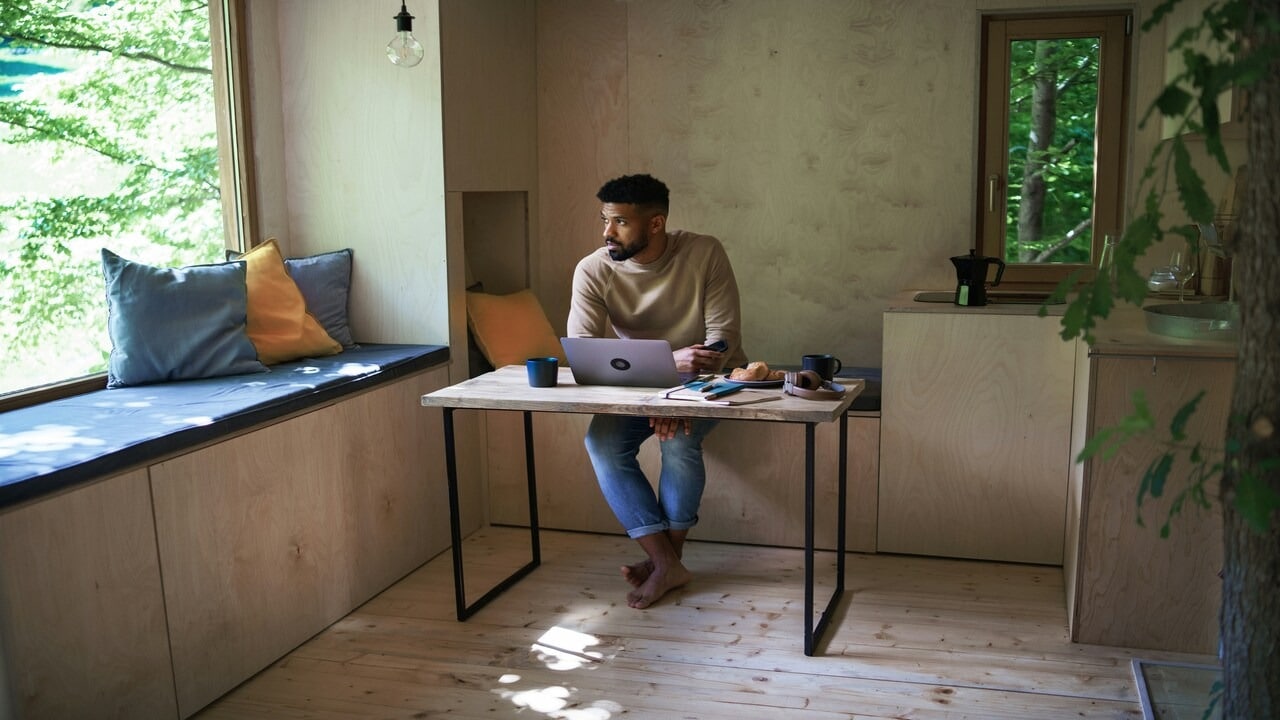 A man working hard at home
