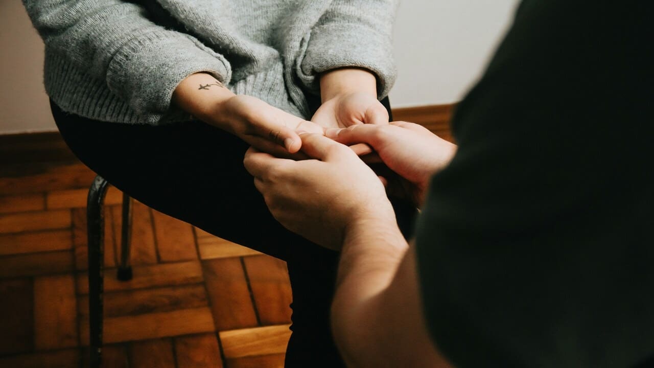 A couple holding hands