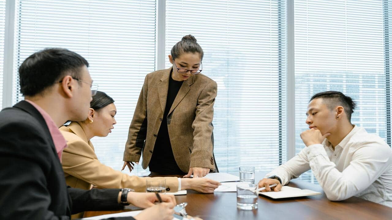 A boss talking to her team