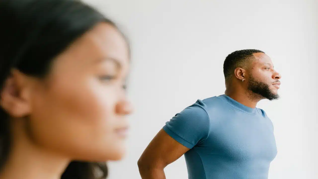 A man and a woman not looking at each other