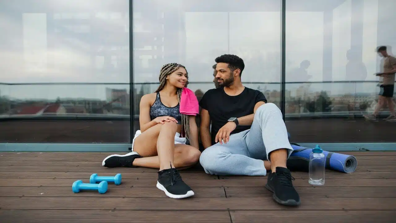 A couple resting after working out