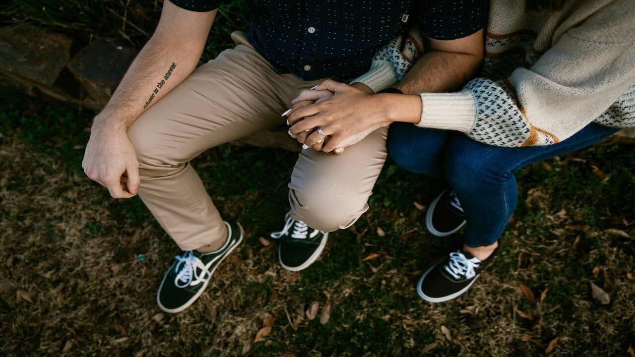 A couple holding hands