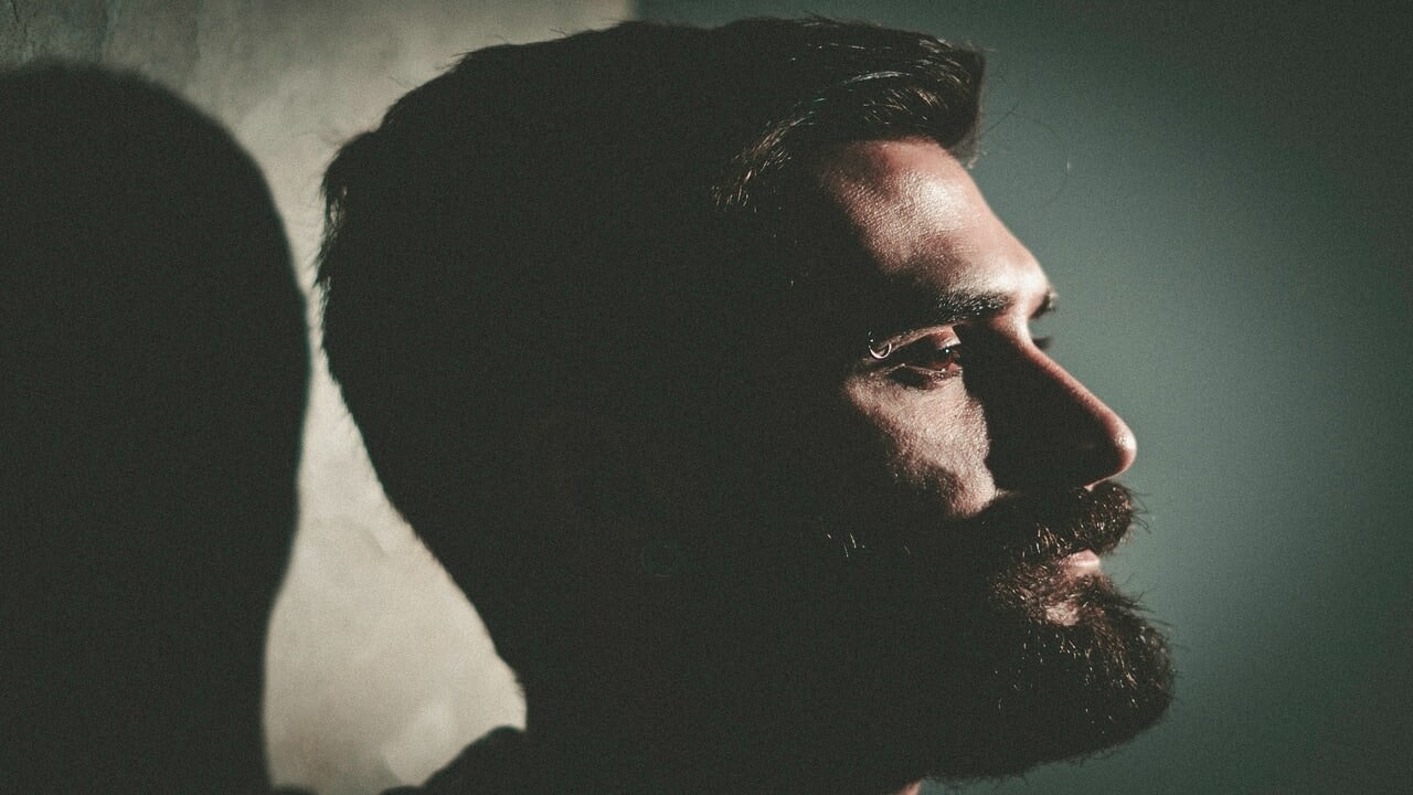 A man looking sad by himself