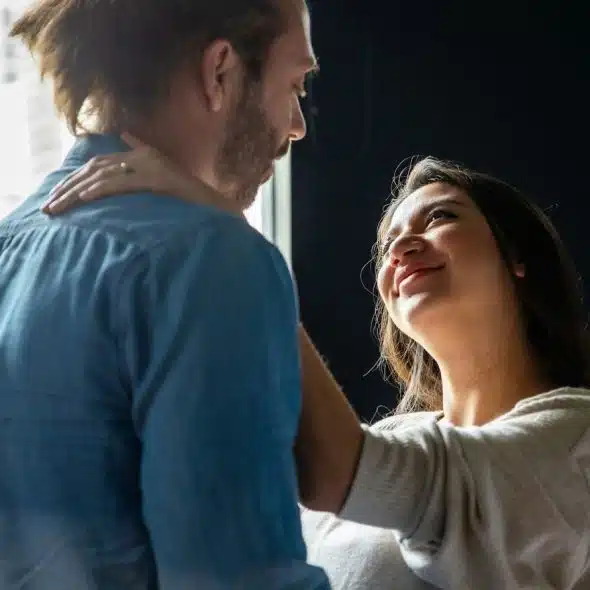 A woman looking up at her partner