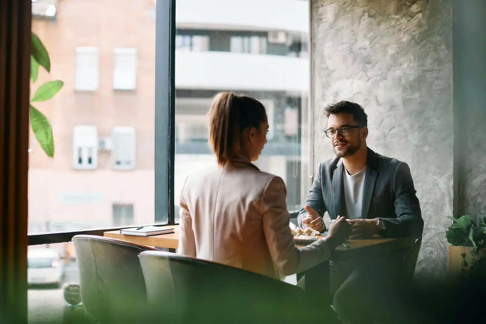 A man talking to woman