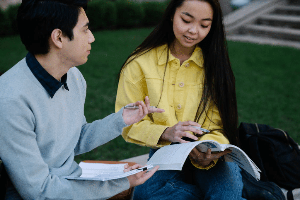 Young couple bonding and writing together
