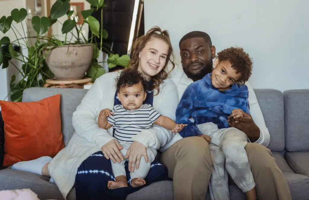 Happy Family Sitting on a Couch