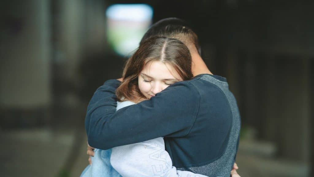 A young couple hugging