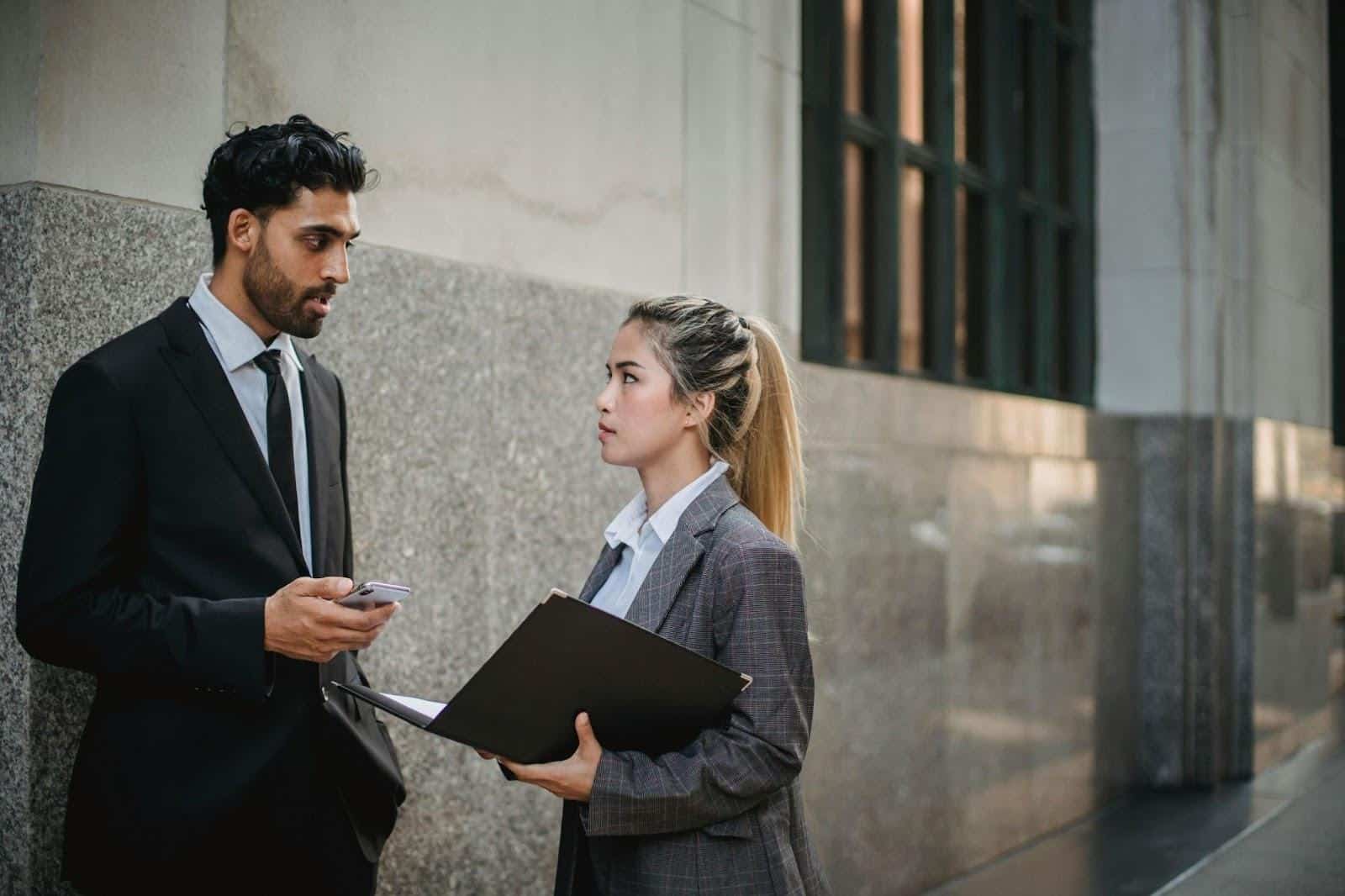 A man and woman talking seriously