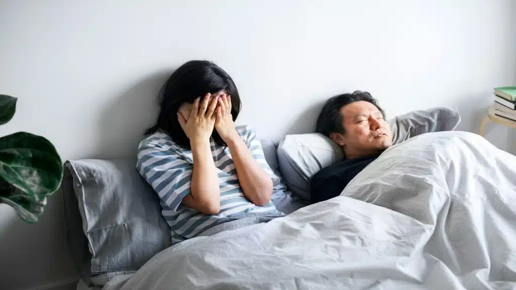 A couple annoyed by her husband