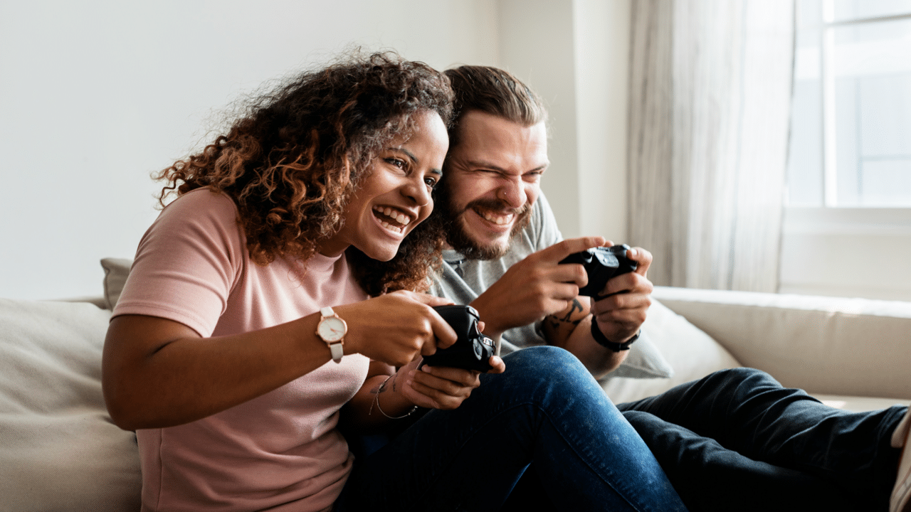 A couple playing a video game together