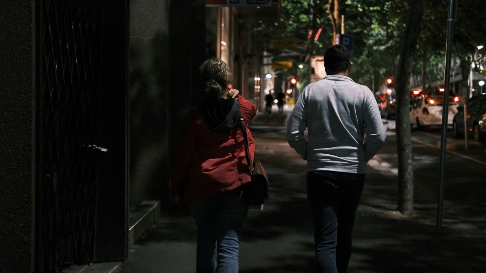 A man and woman walking