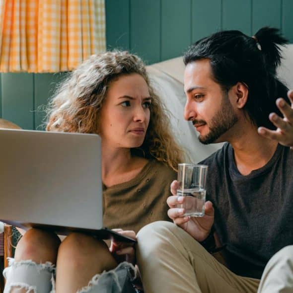 A man trying to speak with woman
