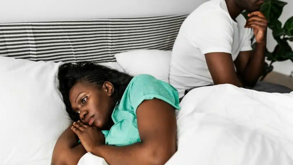 A couple ignoring each other
