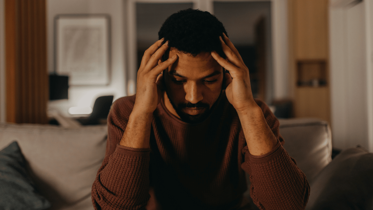 A man looking stressed home