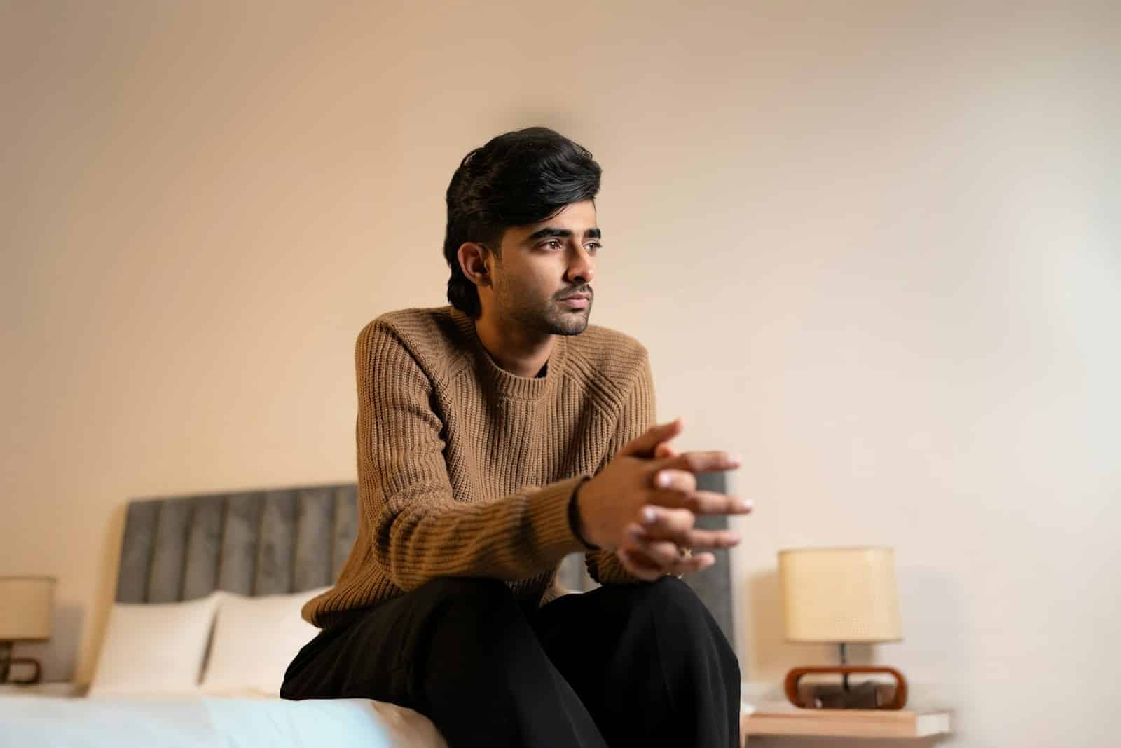 A man thinking indoors