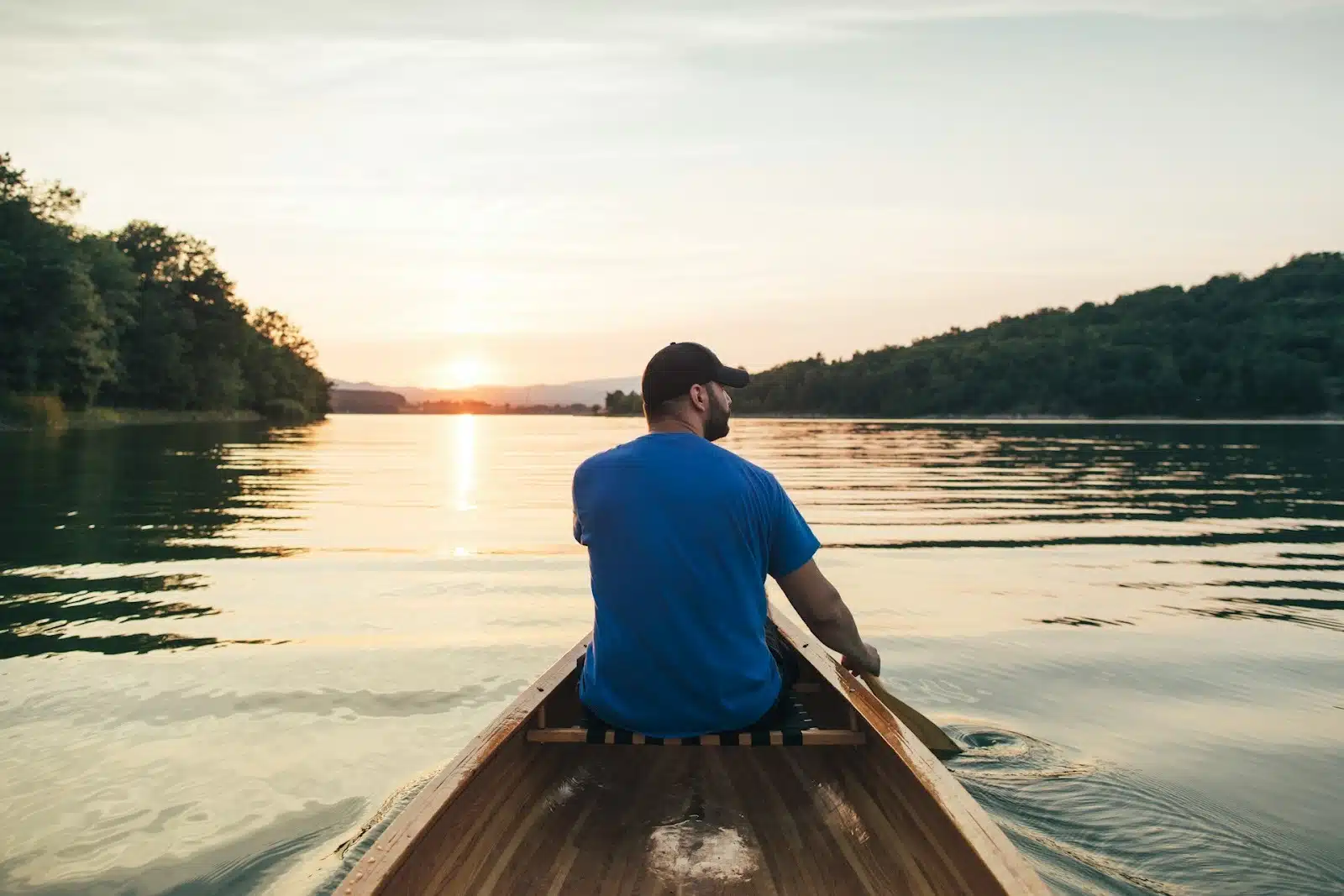 A calm hopeful man outdoors