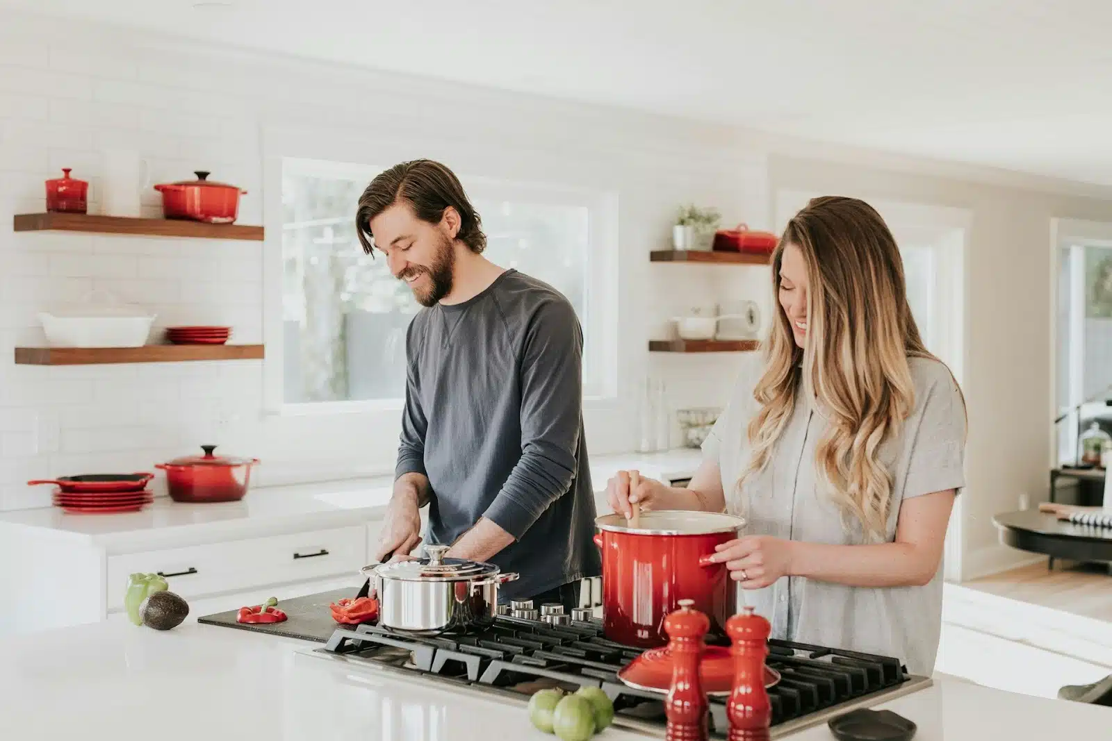 A couple preparing meals together